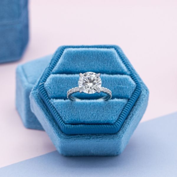 The lab diamond at the center of this engagement ring weighs in at a whopping 3.09 carats.