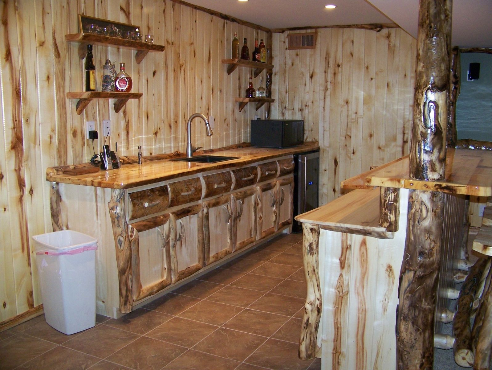 Hand Crafted Custom Refinished Basement With Log Bar, Bar ...