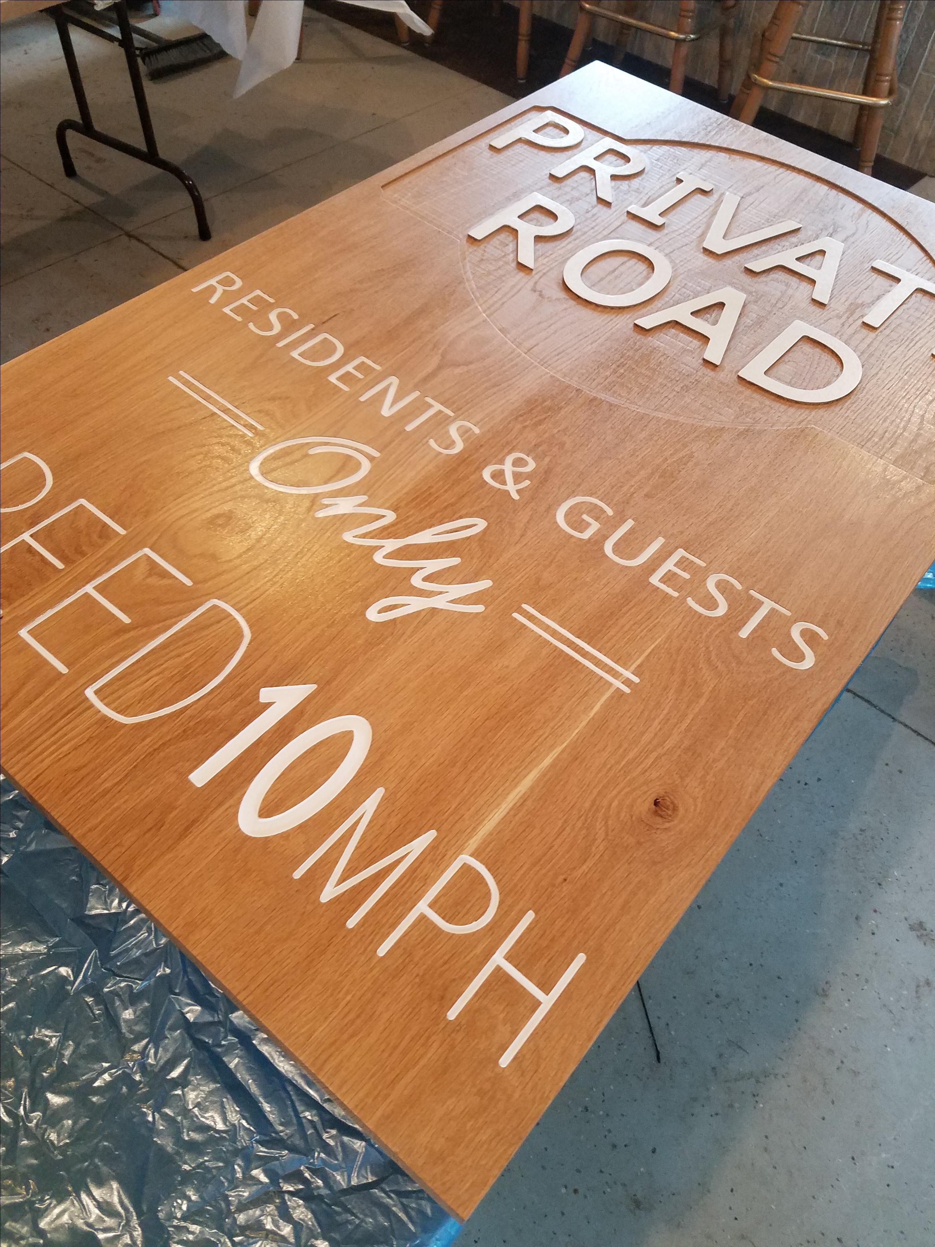 Custom Made Engraved Hardwood Signs by NM Designs