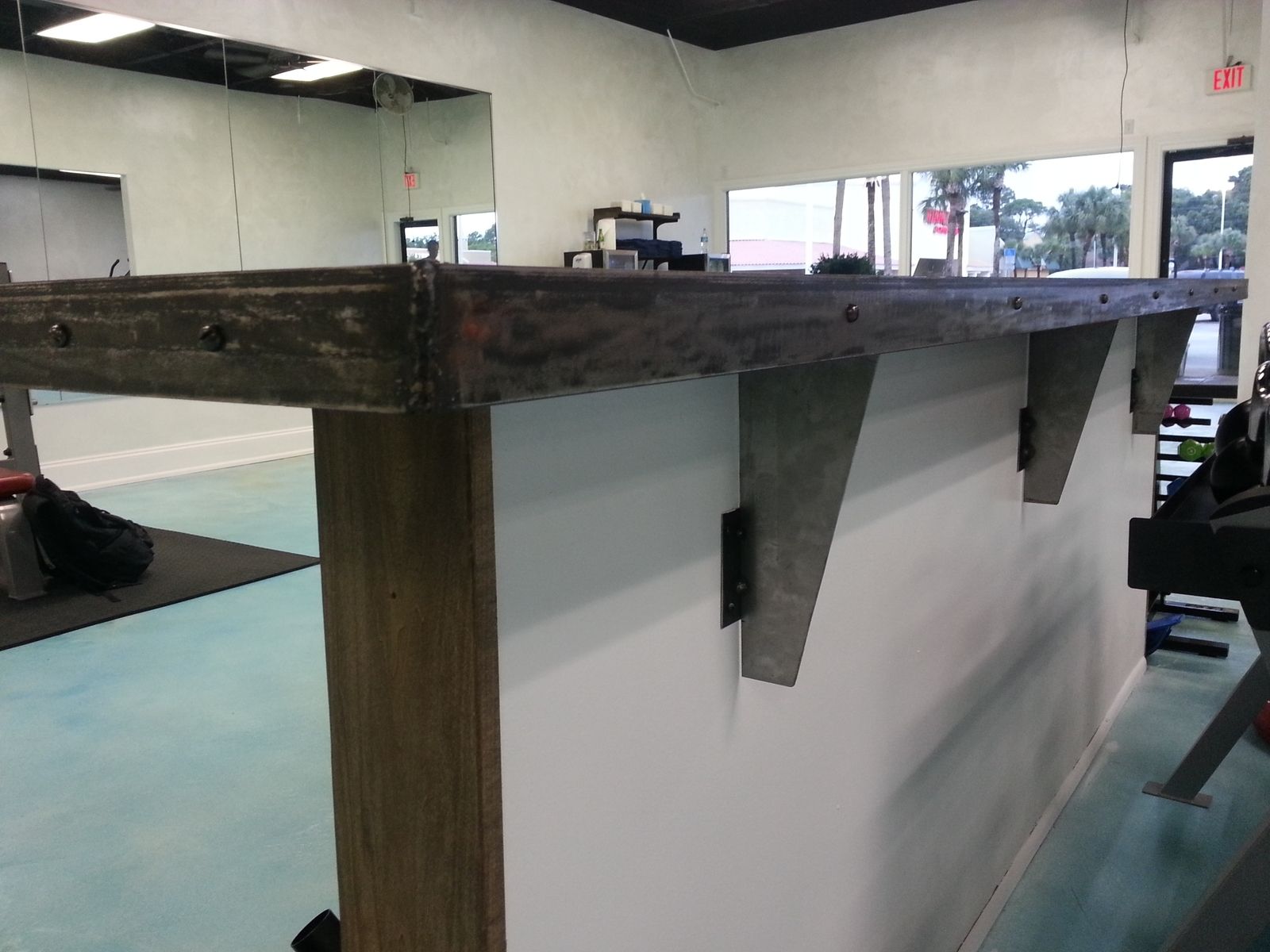 Custom Bar Top Made From Reclaimed Black Walnut And Raw Steel. by RSG