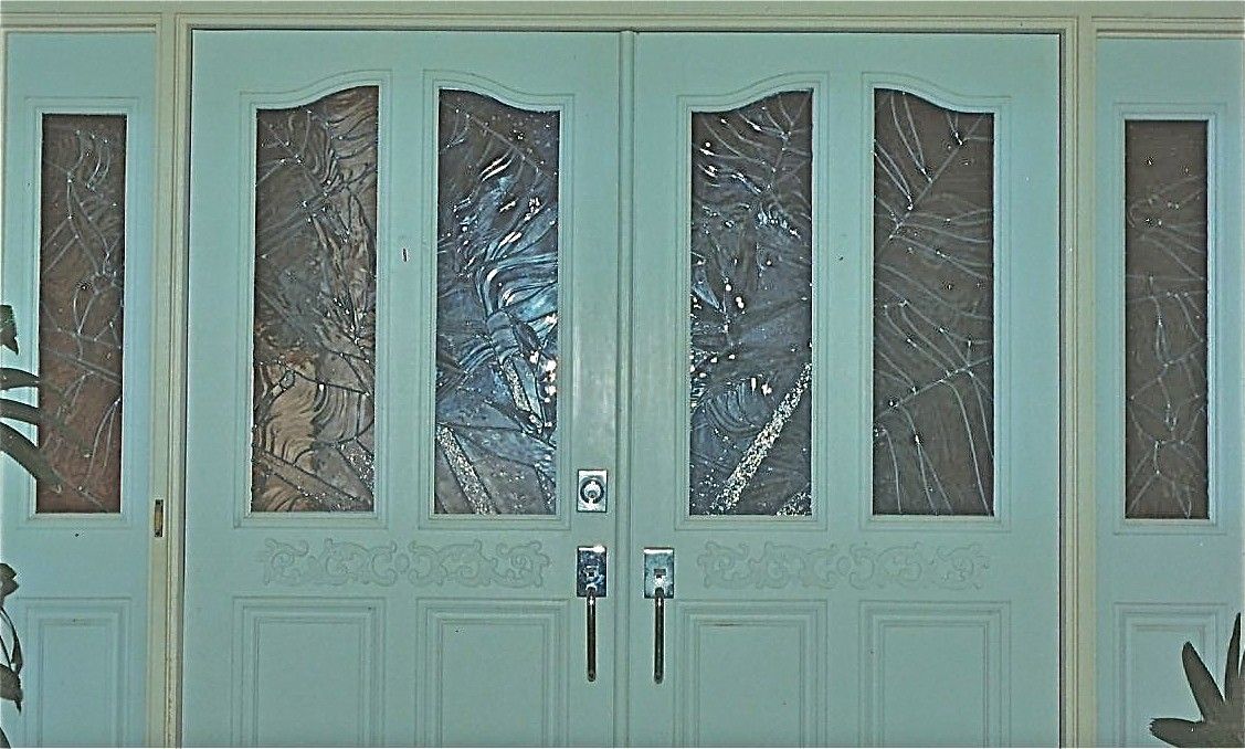 Hand Made Entryway Doors And Side Light Panels Featuring Textured