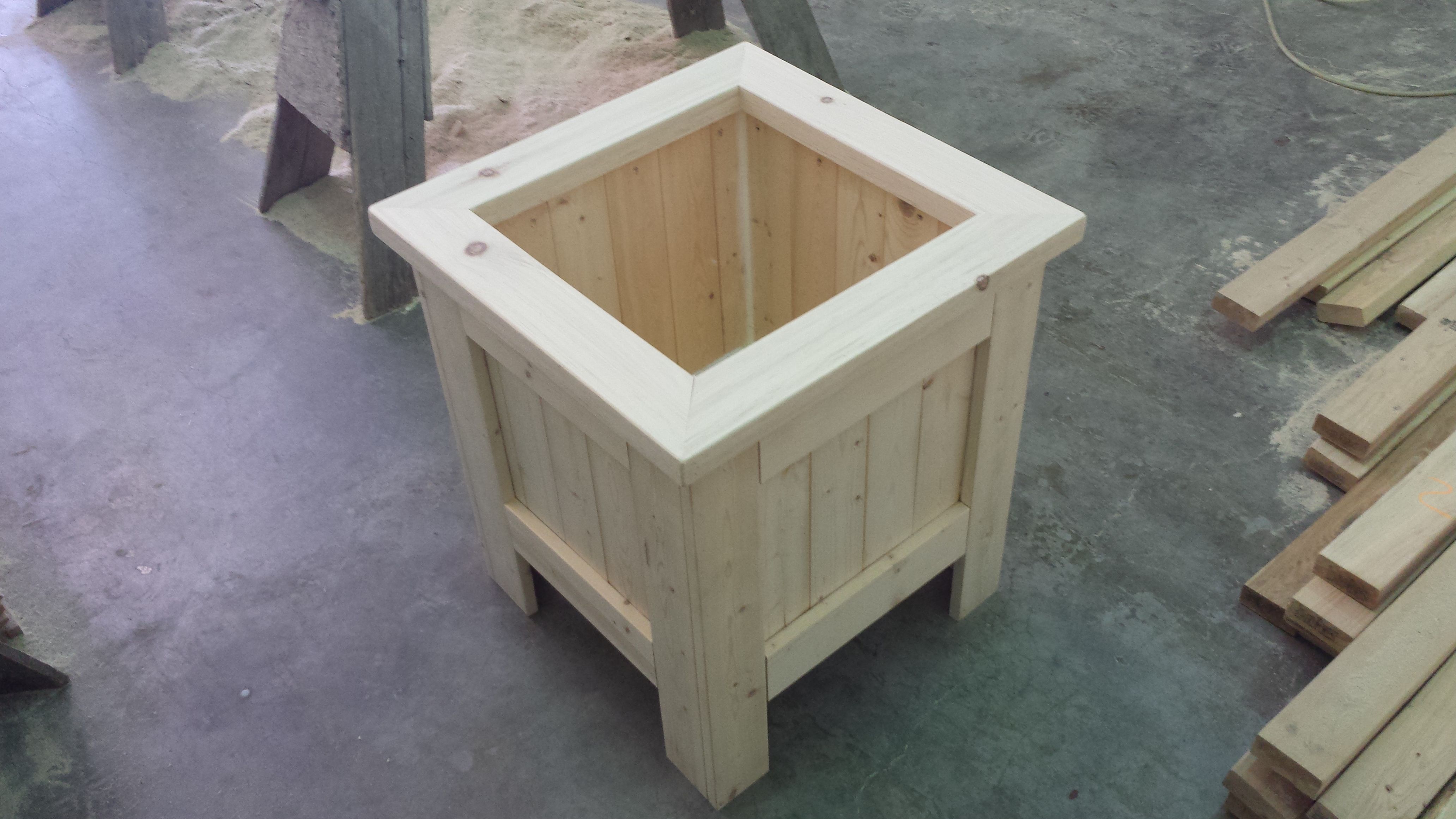 unfinished wooden planter box