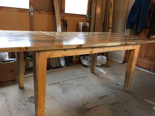 Custom Made Beetle Kill Pine Dinin Room Table With Two Extension Leaves.