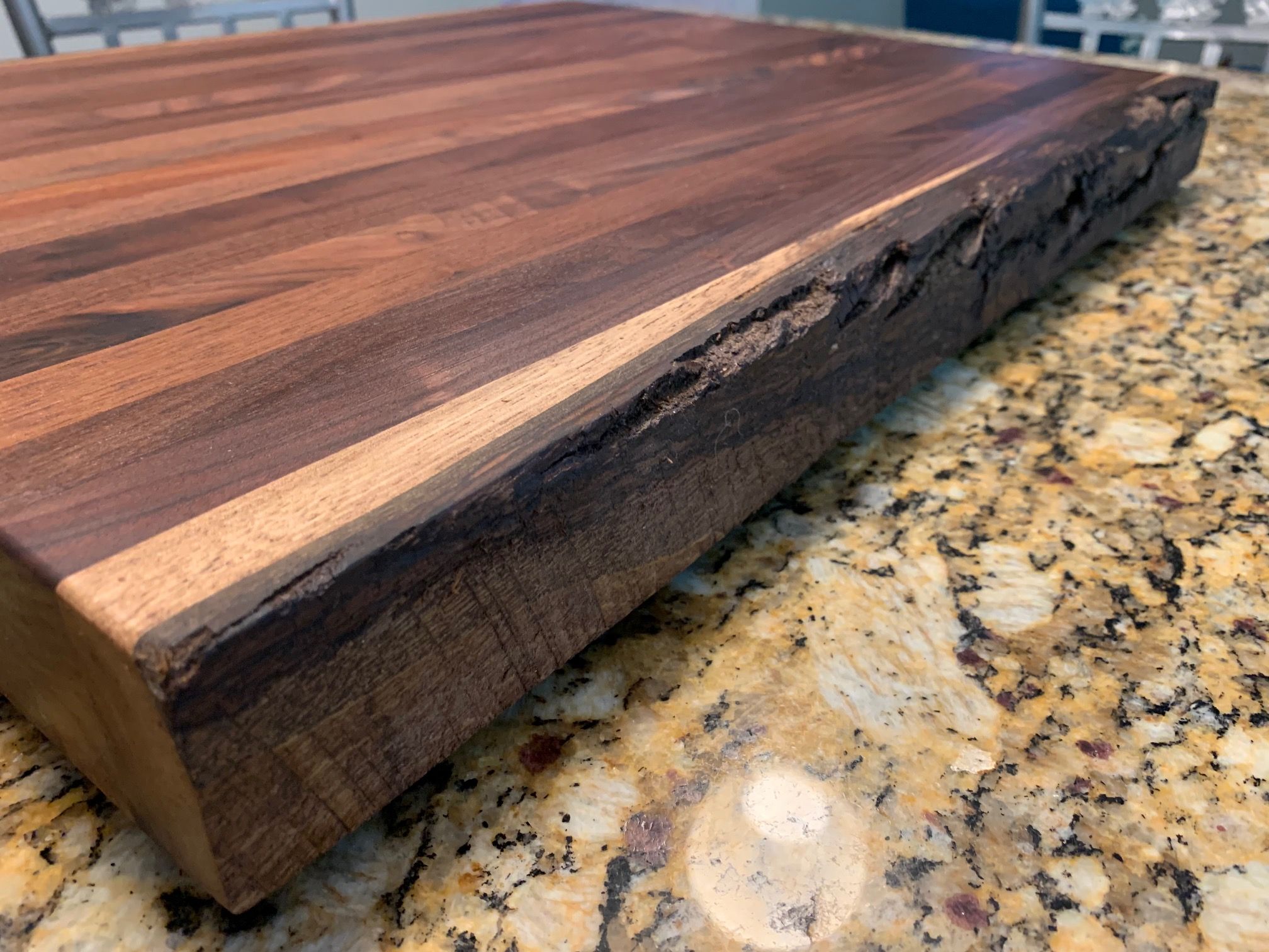 Hand Crafted Live Edge Bark Sided Solid Walnut Cutting Board by Debner