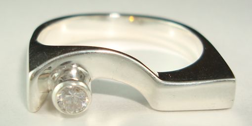 Custom Made Sterling Silver Ring Set With A Sparkling Zircon