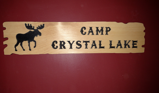 Custom Made Custom Cedar Signs With Silhouette Graphics And Unique Edge